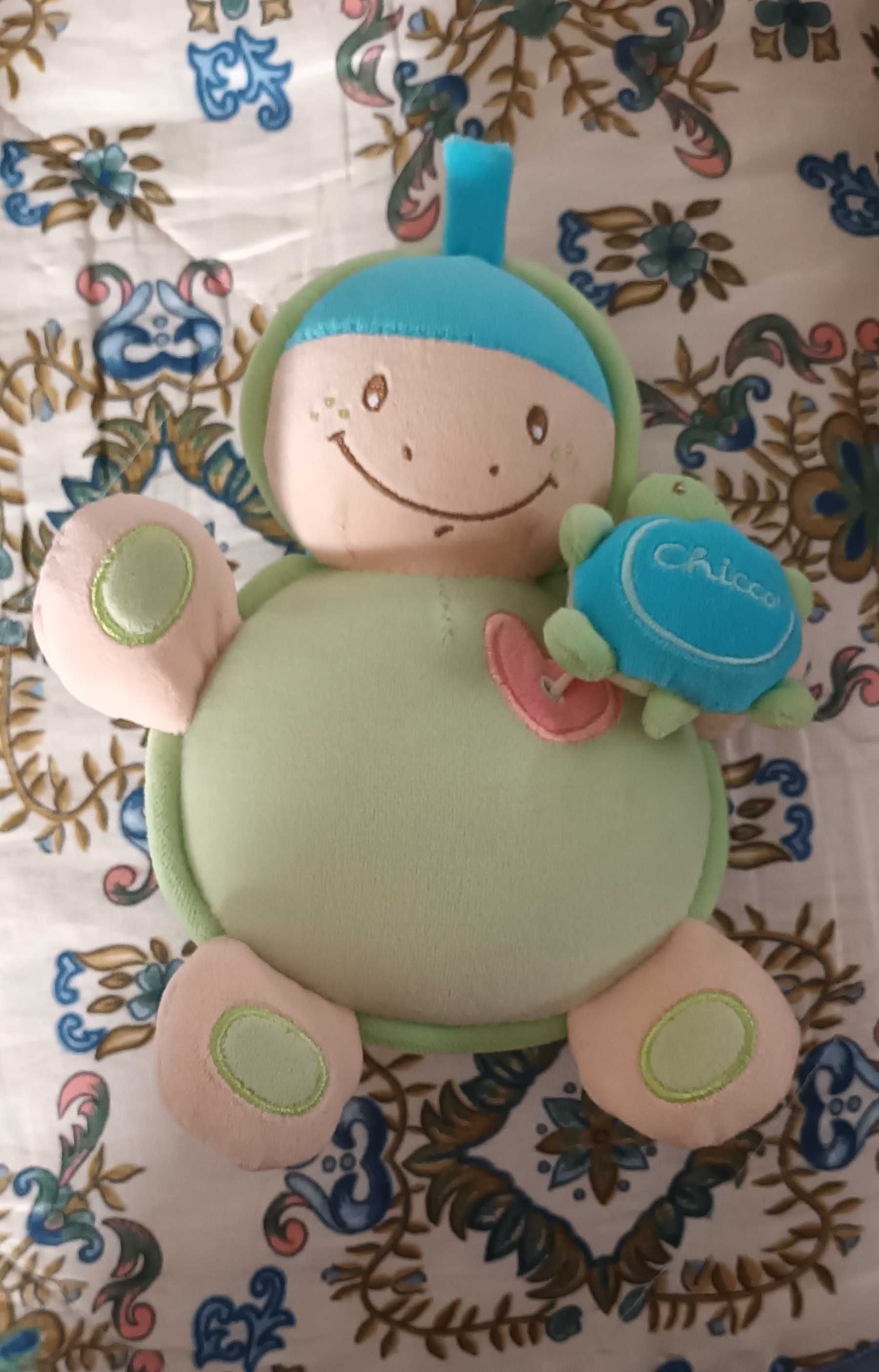 Boneco Chicco com música