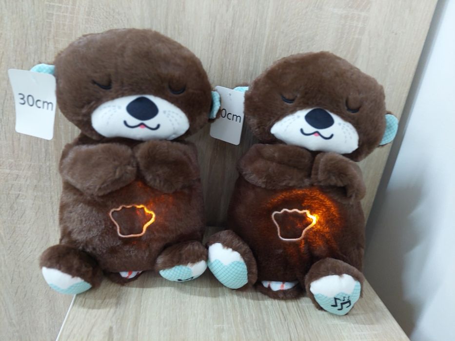 Мішка дихаючий, що світиться і грають мелодії