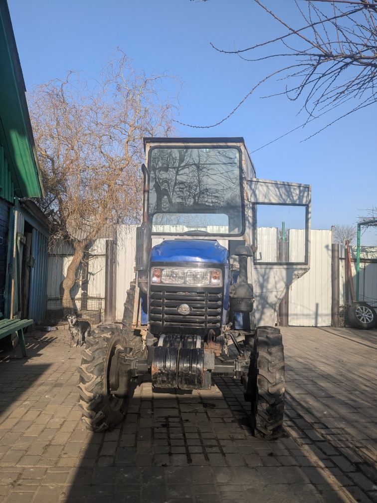 Продам трактор з плужком