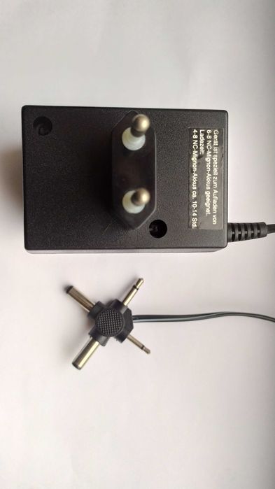 135 гривен Блок питания , Зарядное устройство , Штекер 4 в 1 / Germany