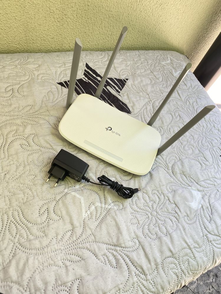 Продам роутер TP-Link EC220-G5