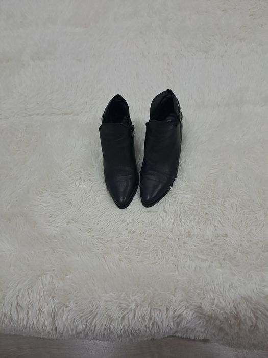 Botins em pele genuina