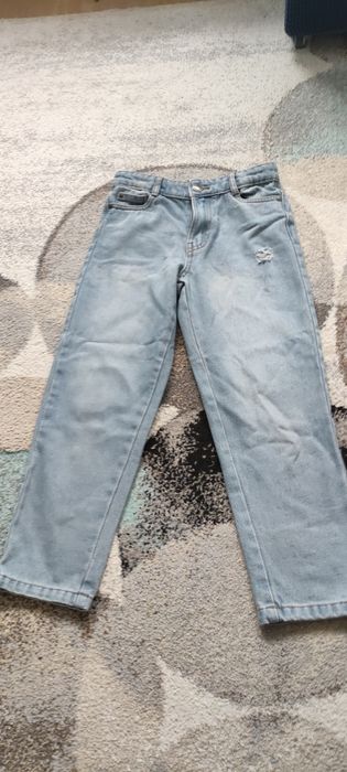 Jeansy niebieskie 134