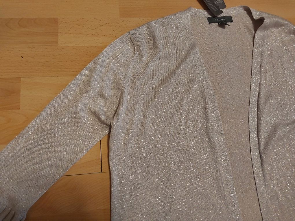 Nowa elegancka narzutka srebrna 42 44 46  bolerko  sweterek zakiet