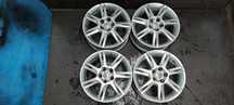 FELGI 5x100 6Jx15 CALI ET38  SEAT IBIZA VW SKODA Komplet