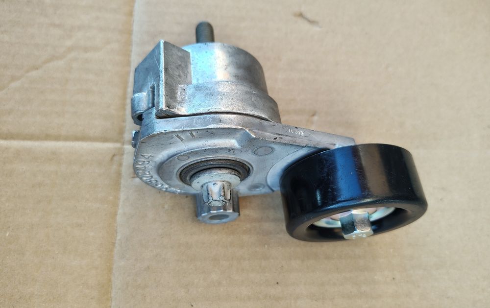 Ролік натяжки генератора Авео Т250/Т255 ОРИГІНАЛ