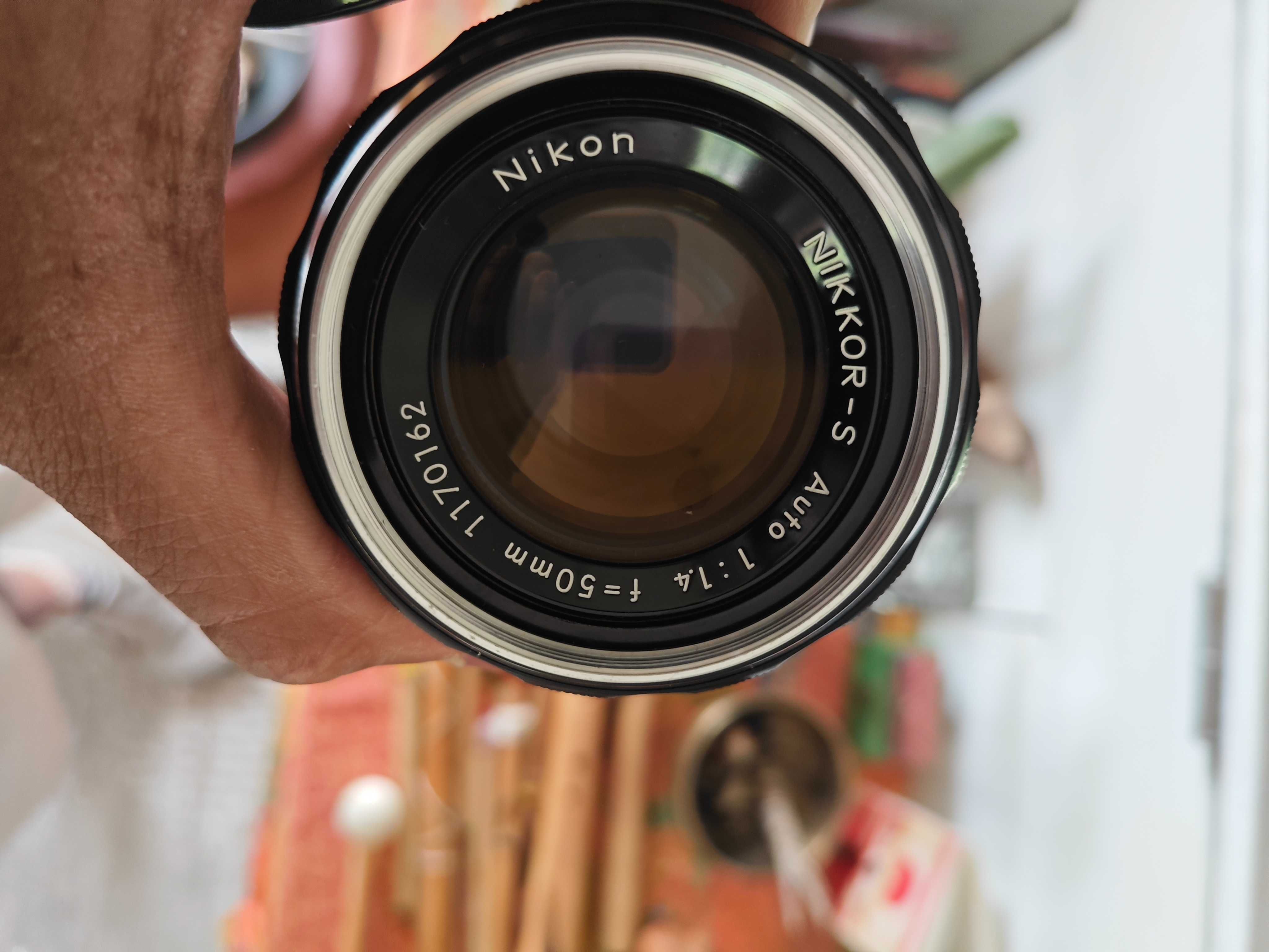 Nikon Nikkor lenses 50mm 1.4, 135mm 2.8, and others.