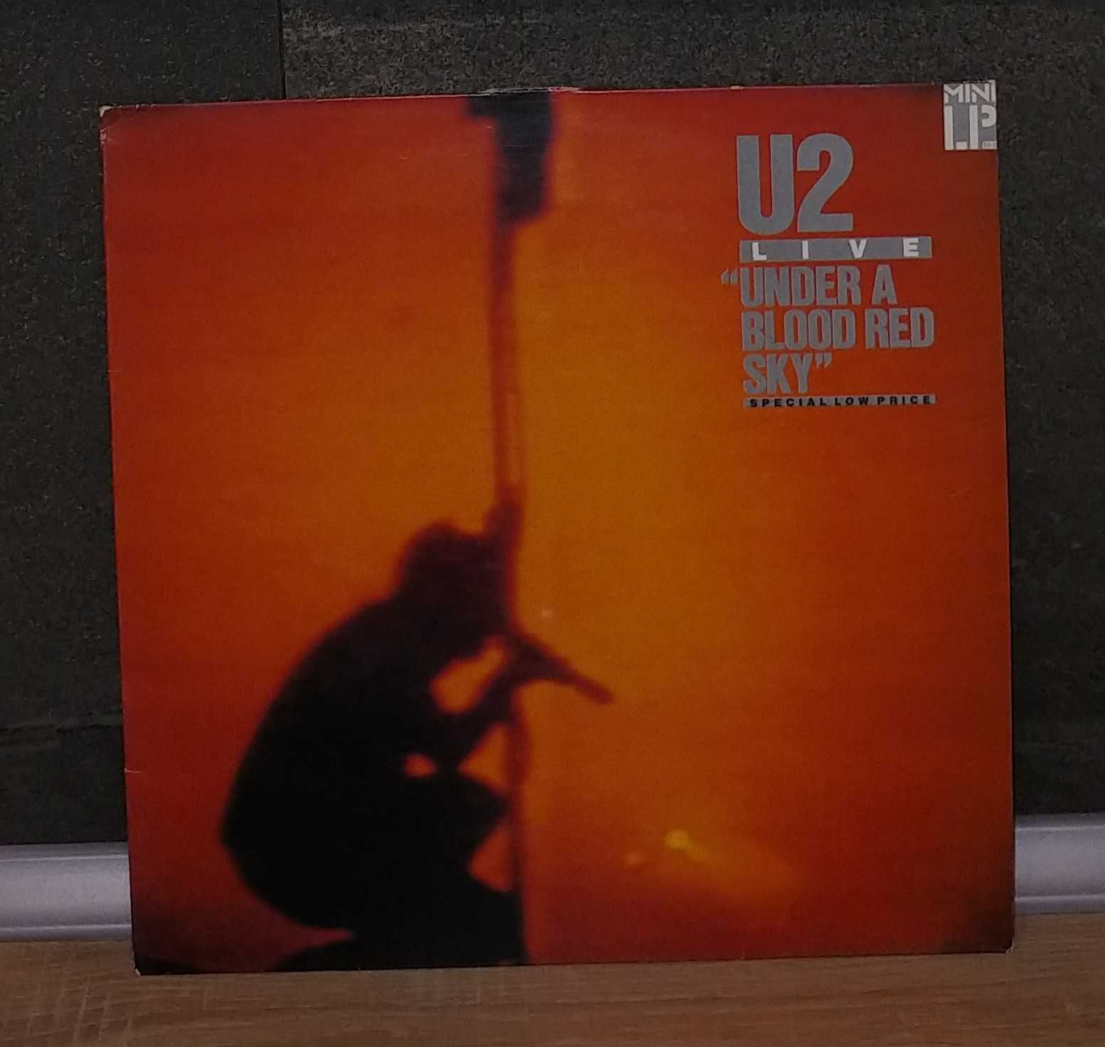 U 2- Under a blood real sky. 1 Press U.K. EX . Płyta winylowa .