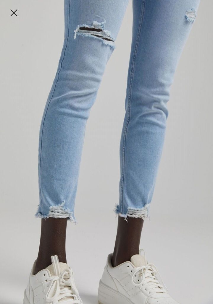 Spodnie jeansowe Bershka przecierane z dziurami r. 38