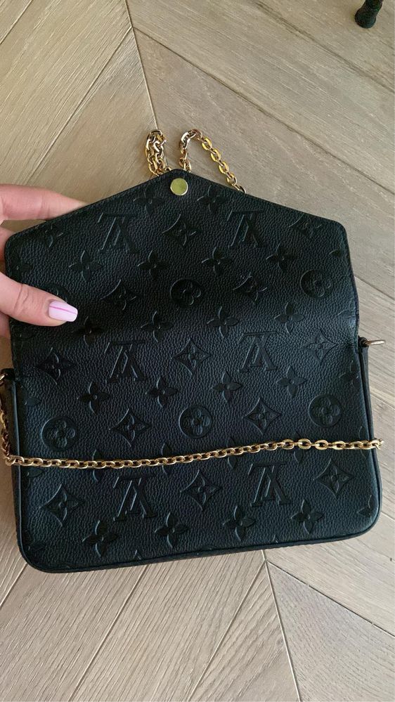 listonoszka louis vuitton