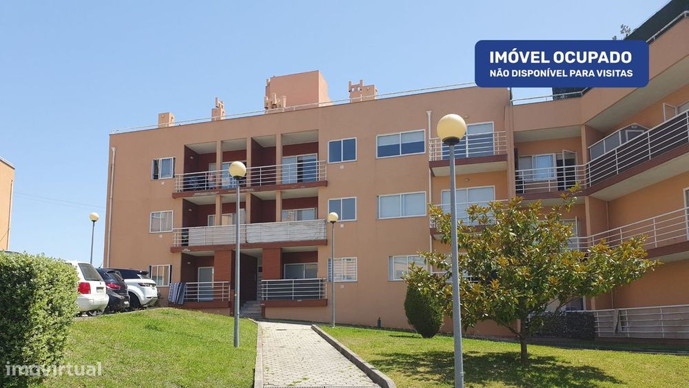 Apartamento T2 em Canelas com Varanda e Garagem - Oportunidade Única