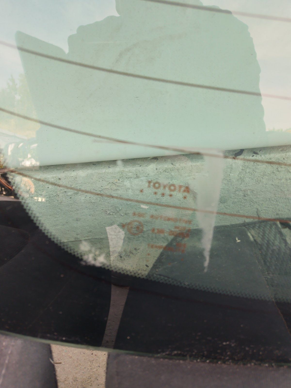 Скло заднє з підігрівом оригінал Toyota Camry 17-23 року