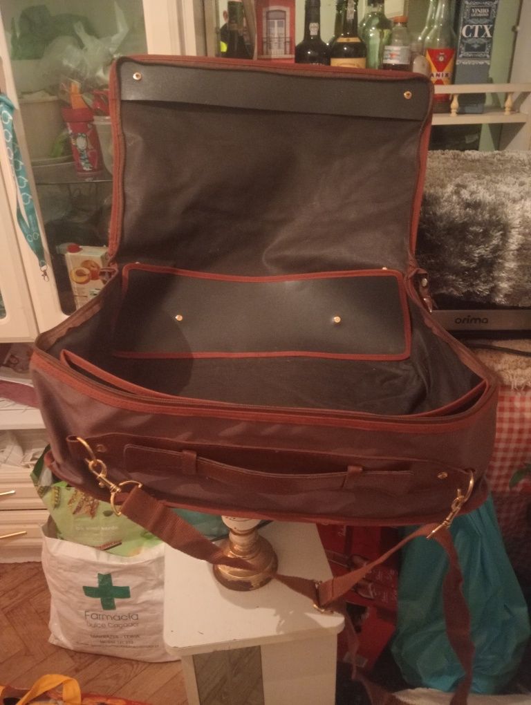 Malas e bolsas como novas