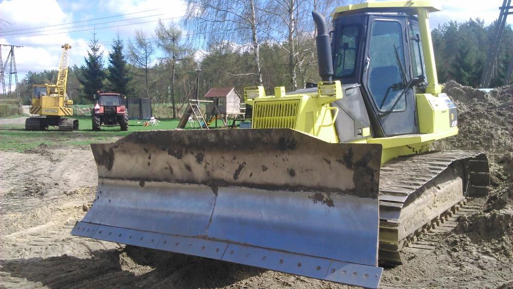 Kopanie, czyszczenie stawów, wyrównanie terenu, usługi spycharka