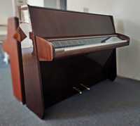 pianino Schimmel z przezroczystą pokrywą klawiatury