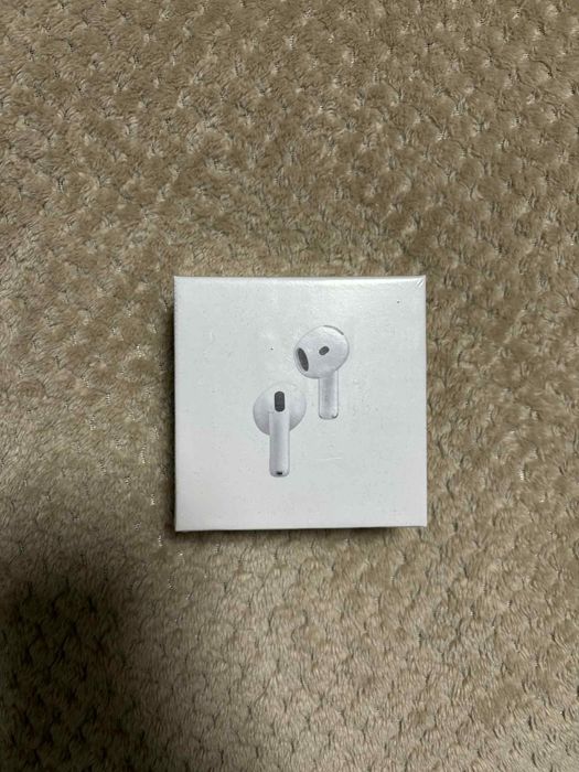Airpods 4 słuchwki bezprzewodowe.