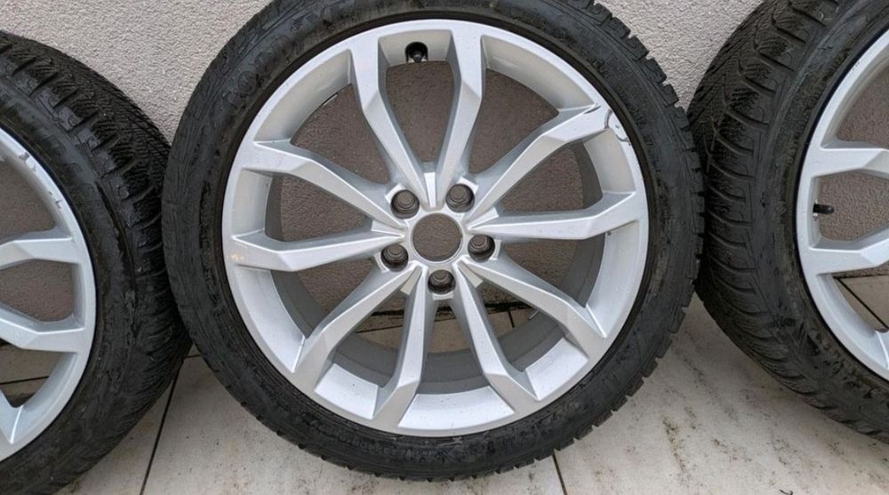 Oryginalne alufelgi Audi 5x112 r18" z oponami zimowymi