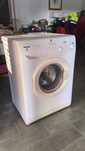 Máquina de lavar a roupa Hoover Nextra HNL6126-86 S avariada
