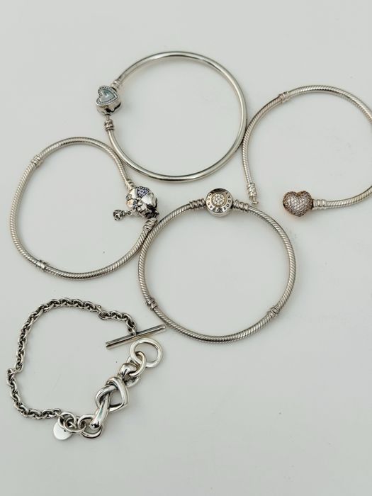 PANDORA. Каблучки, браслети, сережки, прикраси на шию.