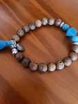 Pulseira castanha e azul