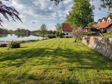 Duży dom linia brzegowa wynajem Mazury pomost sauna agroturystyka