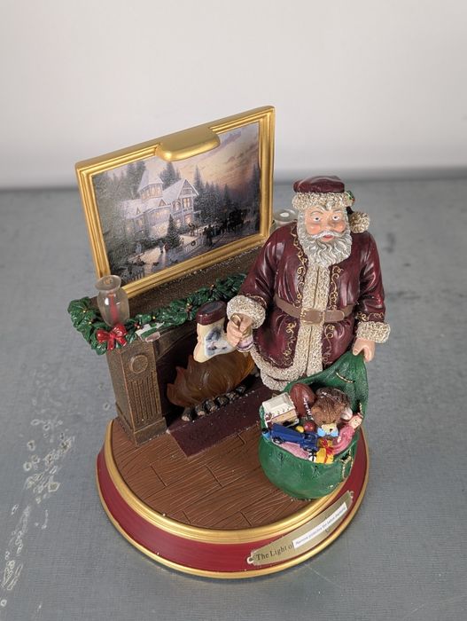 Świąteczna figurka Światło Bożego Narodzenia św Mikołaj Thomas Kinkade