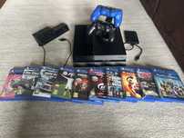 PS4 Fat 500GB + 2 pady + 4 gry