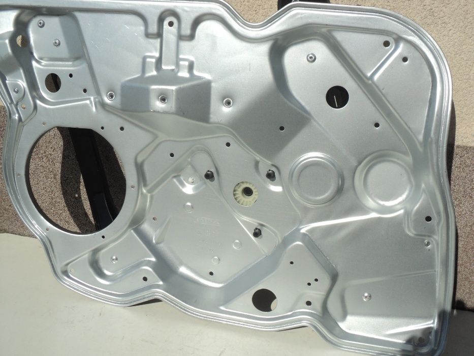 podnośnik szyby mechanizm opuszczania przód skoda octavia II