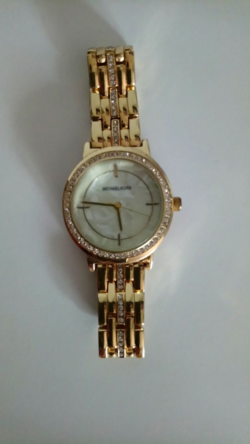 zegarek elegancki  Michael Kors  z bransoletką koloru złotego Okazja