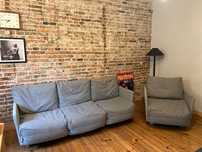 Markowa sofa i fotel Comforty projekt Rygalik 234 cm dł szara