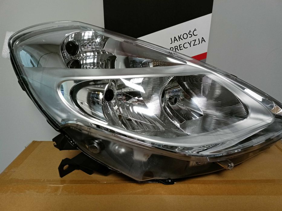 Renault Clio 3 09- Lampa/Reflektor  prawy chrom /H7+H7