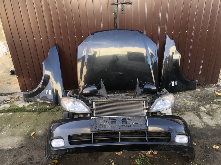 Передній Бампер Chevrolet Lacetti  комплектний перід чорний