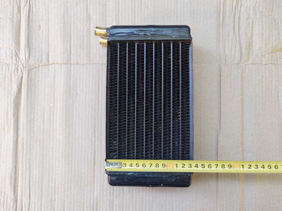 Радиатор печки, крыльчатка помпы, фиксатор рычага КПП