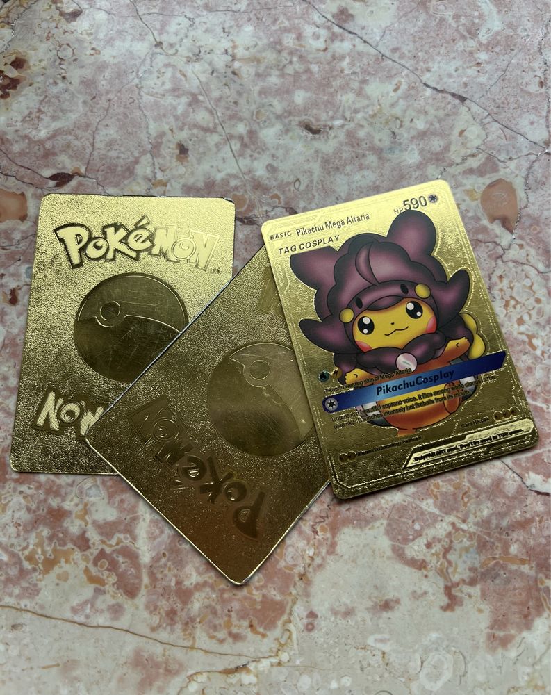 3 zlote karty Pokemon - Pikachu / Charizard + kody to gry