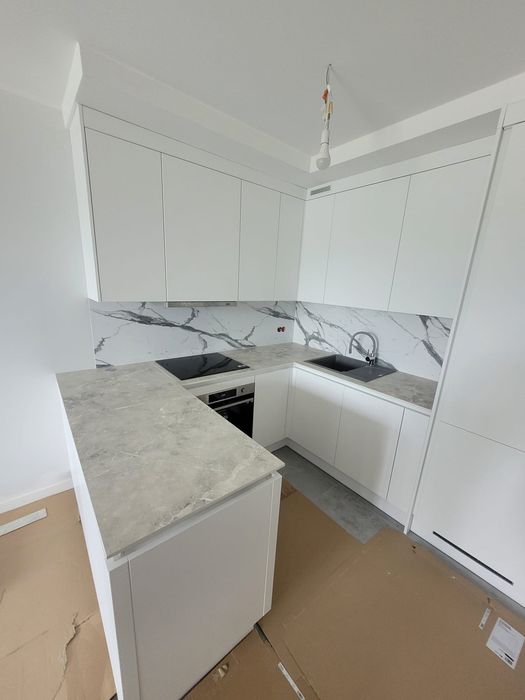 Montaż kuchni przeróbki montaż mebli z paczki i blatow kompakowych