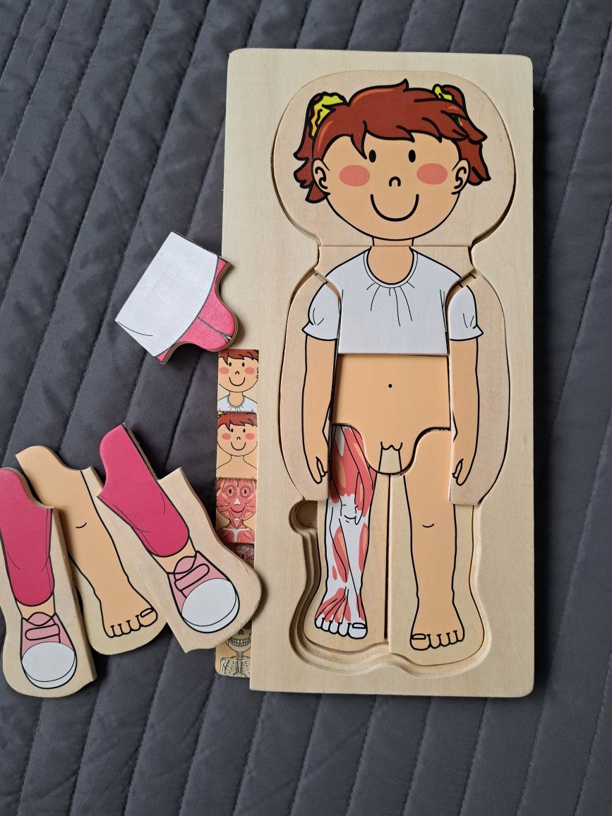 Zestaw zabawek: puzzle ciało człowieka, tablica Alfabet, memory i inne