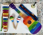 Instrumenty muzyczne gitara cymbałki flet dzwonek,marakasy