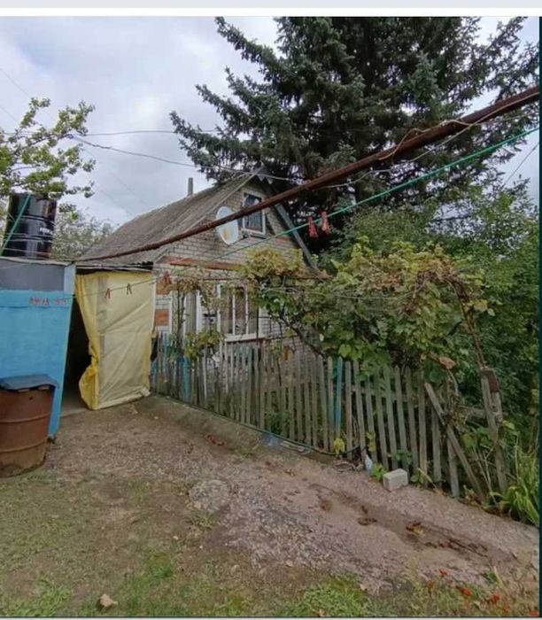 Продам дом -дачу в Высоком. Участок 10 соток .Печное отопление TB