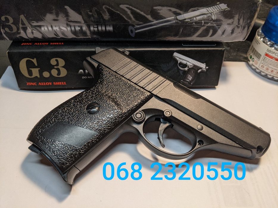 Металевий пістолет на пульках іграшкова зброя