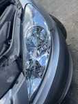 FAROL OTICA ESQUERDA PEUGEOT 307 ANO 2005