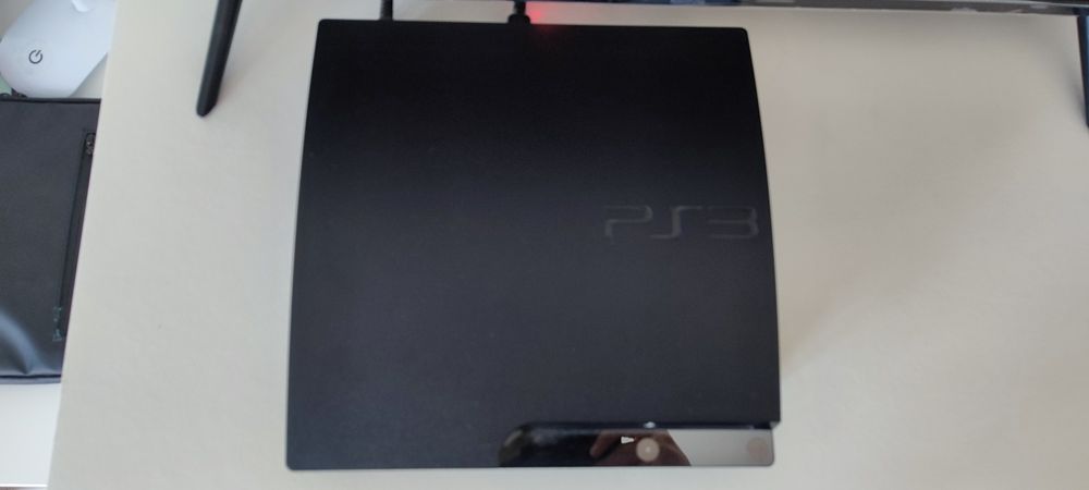Playstation 3 + comandos +jogos