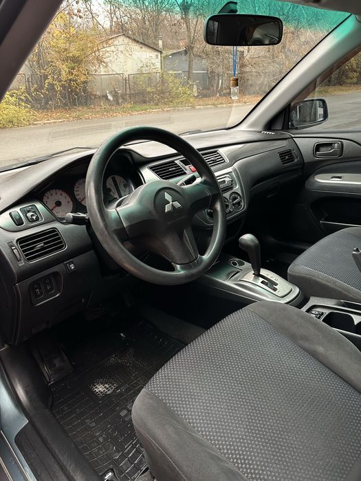 Продам лансер 9 автомат газ/бензин рестайлинг