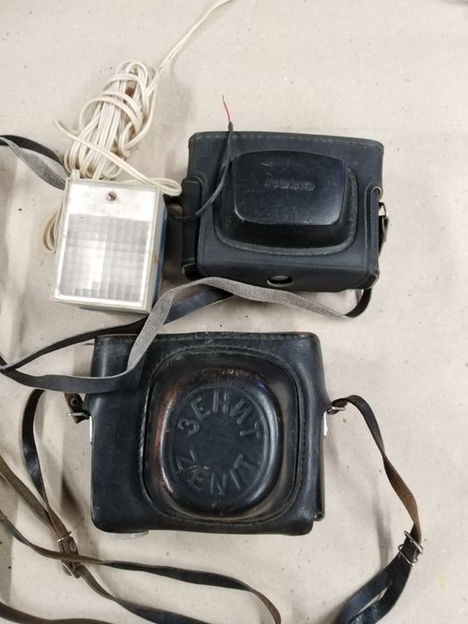 Фотоапарати Зеніт Е, Смєна символ