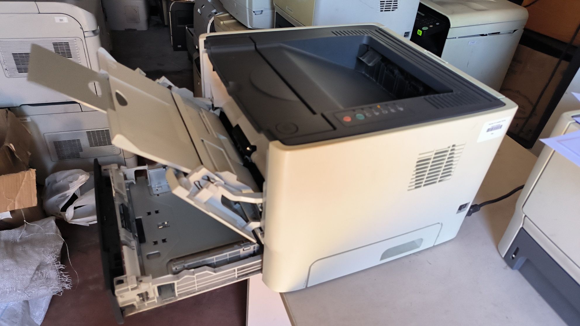 Принтери LaserJet P2015d  (dn)