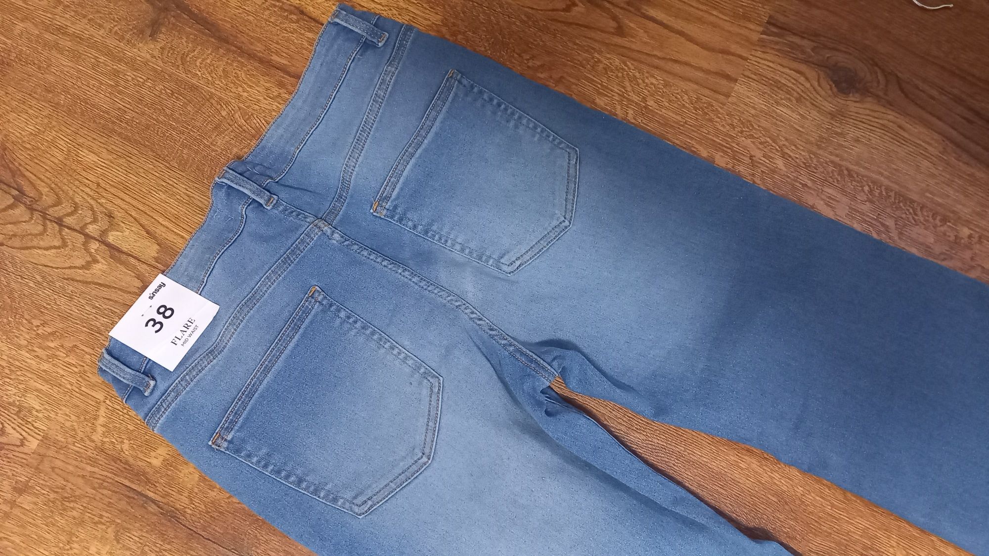 Spodnie jeansy dzwony Sinsay nowe roz.38