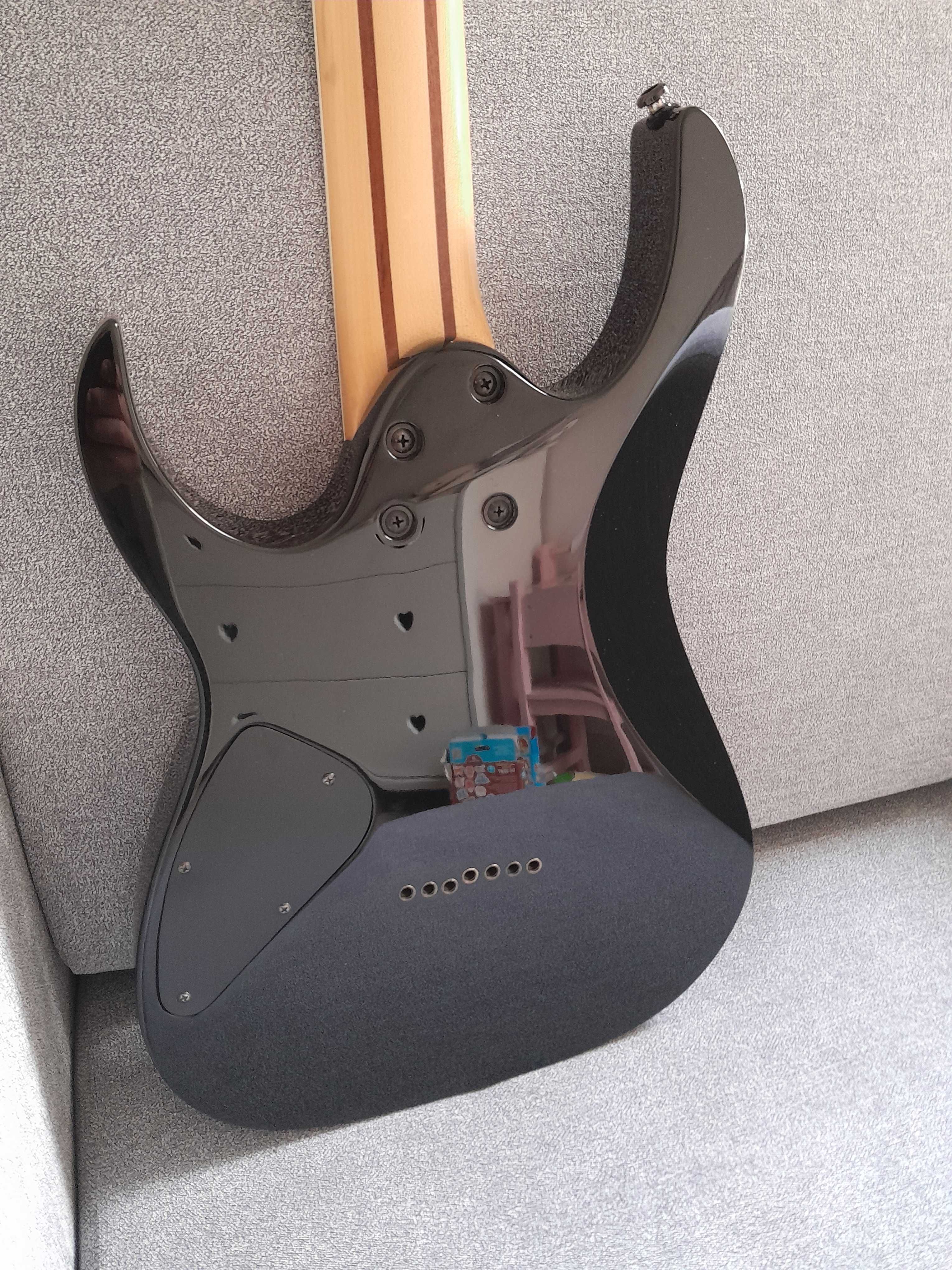 Ibanez RG7321, 7 strun, DiMarzio, Indonezja, siodełko kość. Zamiana