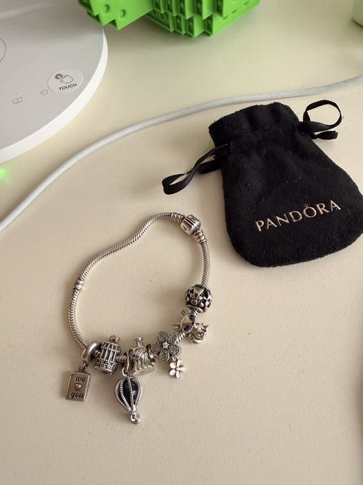 Продам браслет із 7 шармами оригінальне все