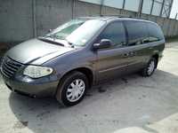 CHRYSLER Grand Voyager zacisk hamulcowy lewy przód 04-07 rok