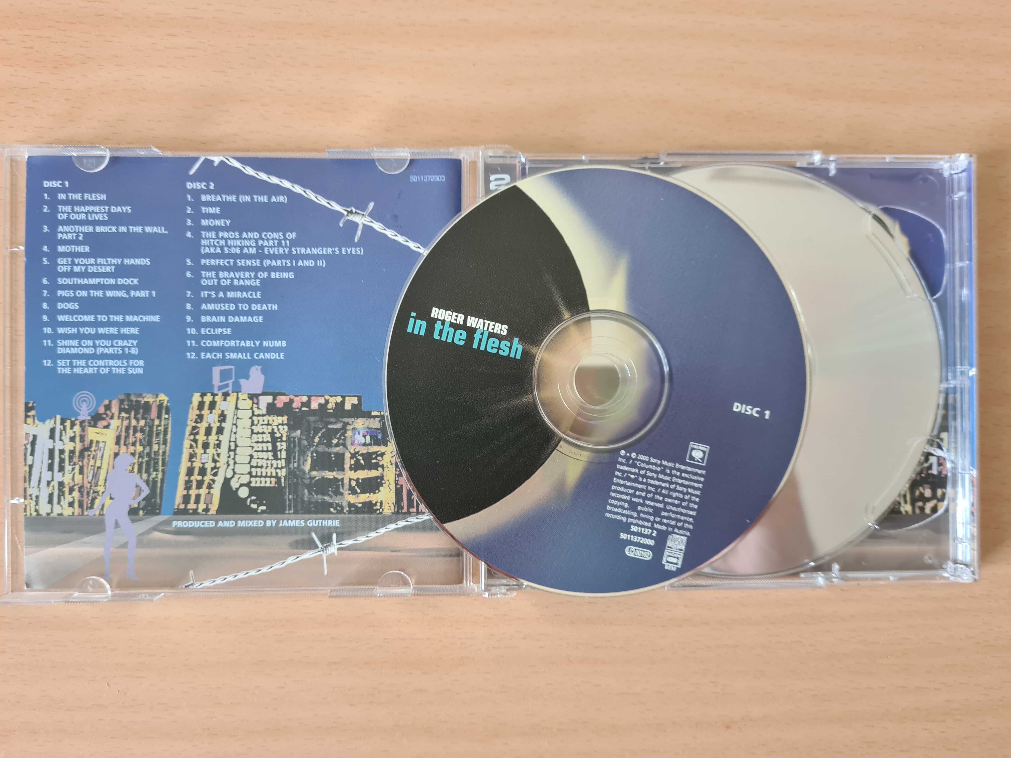 CDs audio com o álbum "In the Flesh" de Roger Waters