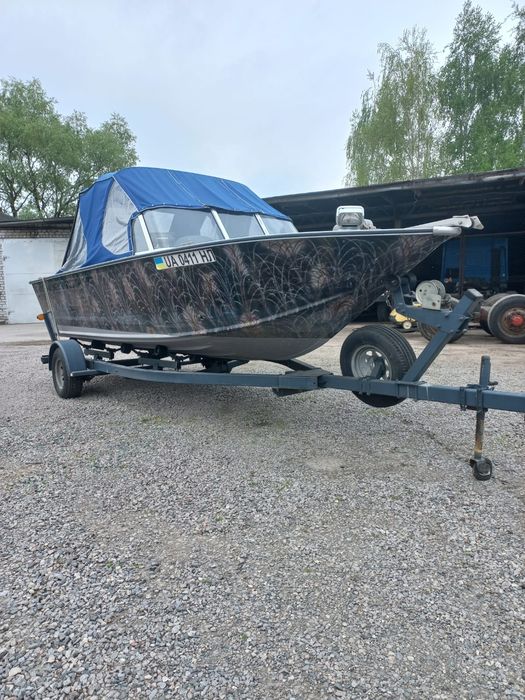 Моторний човен Sylvan Boat